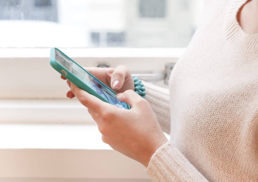 woman using smartphone