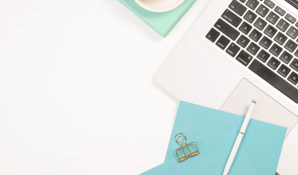 Laptop, notecards, pen. The text reads, "Restored 316 Review: What You Need To Know + My Favorite Themes!"