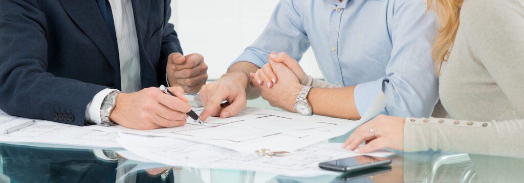 home owers signing paperwork