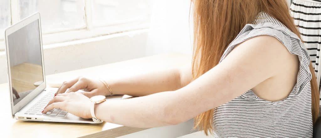 woman at a computer working from home