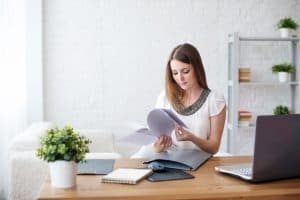 woman working from home as an example of jobs where you work alone