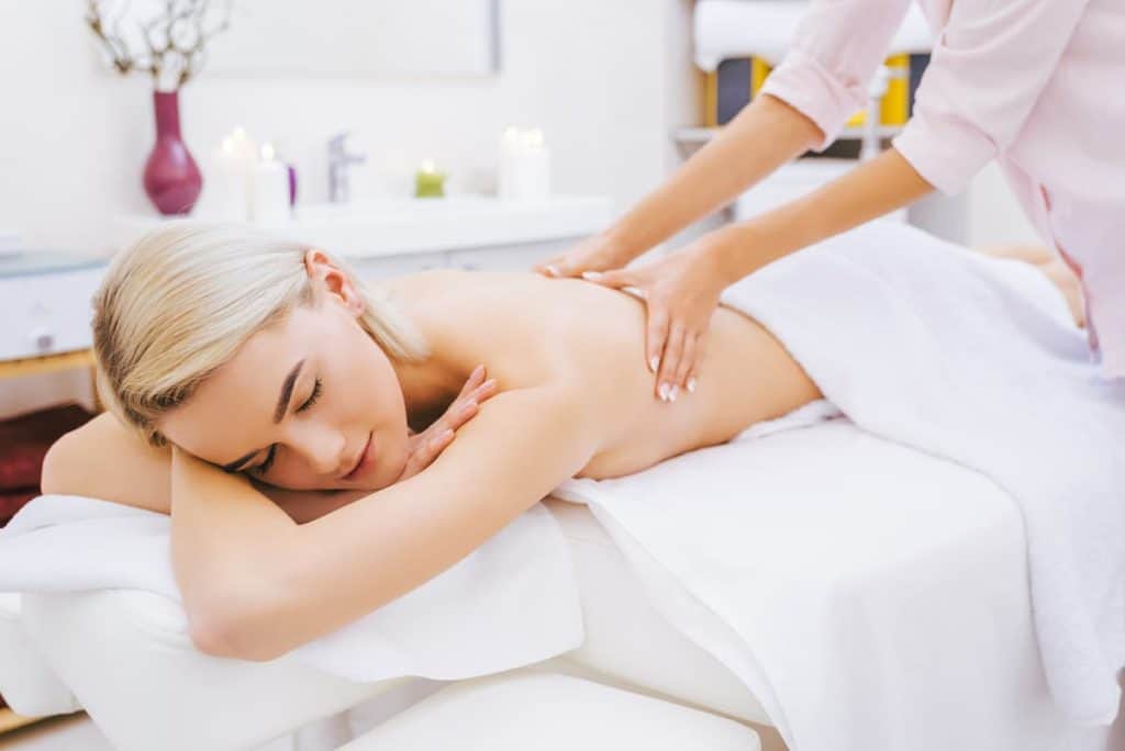 Woman receiving a back massage