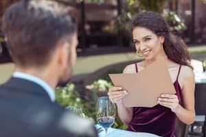 Man and woman on a paid date